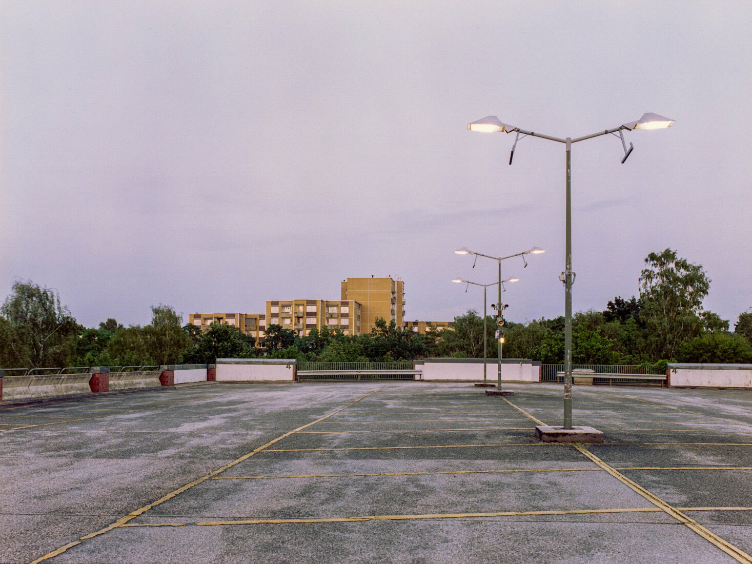 the empty rooftop of a parking garage